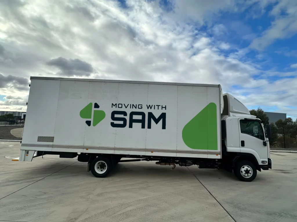 A Moving with Sam removal truck