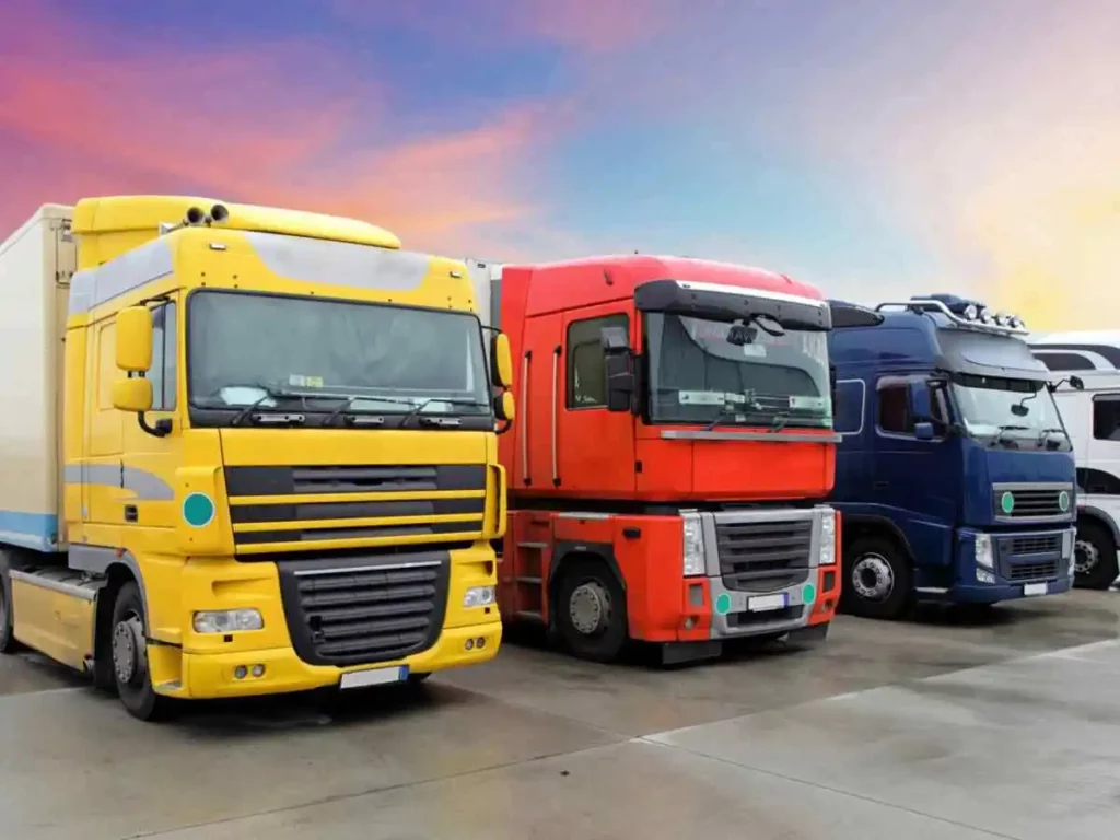 A line of interstate trucks at a depot